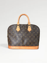 141 - Louis Vuitton Alma PM